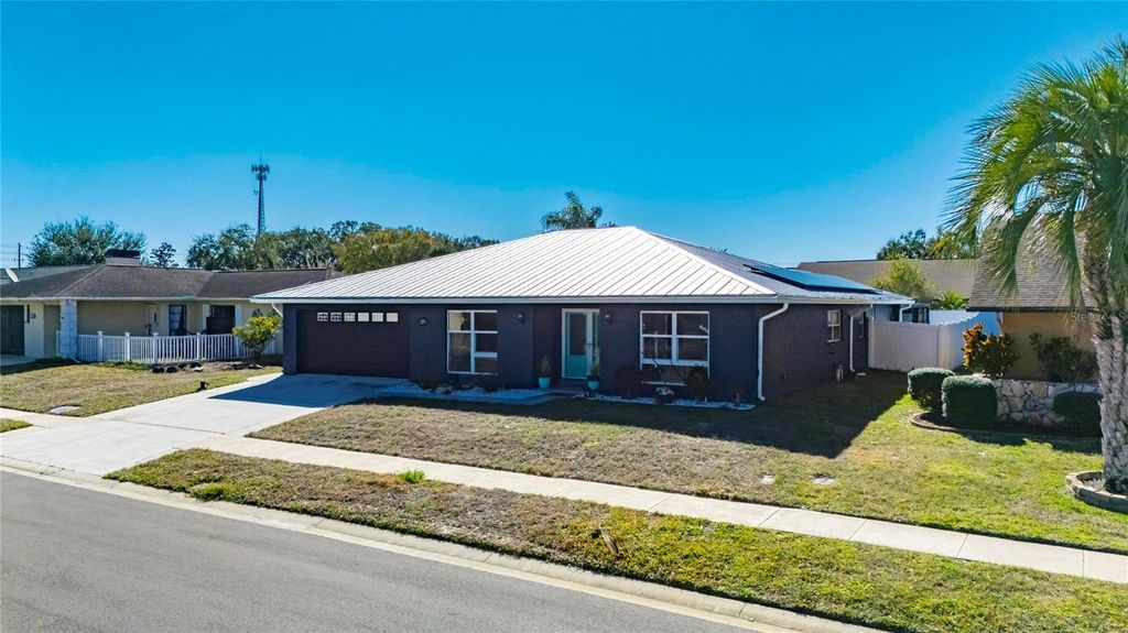 Photo of 7906 Bahama Avenue, Port Richey, FL 34668 (MLS # TB8474250)