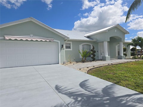 Photo of 119 NW 3rd Place, Cape Coral, FL 33993 (MLS # W7890341)