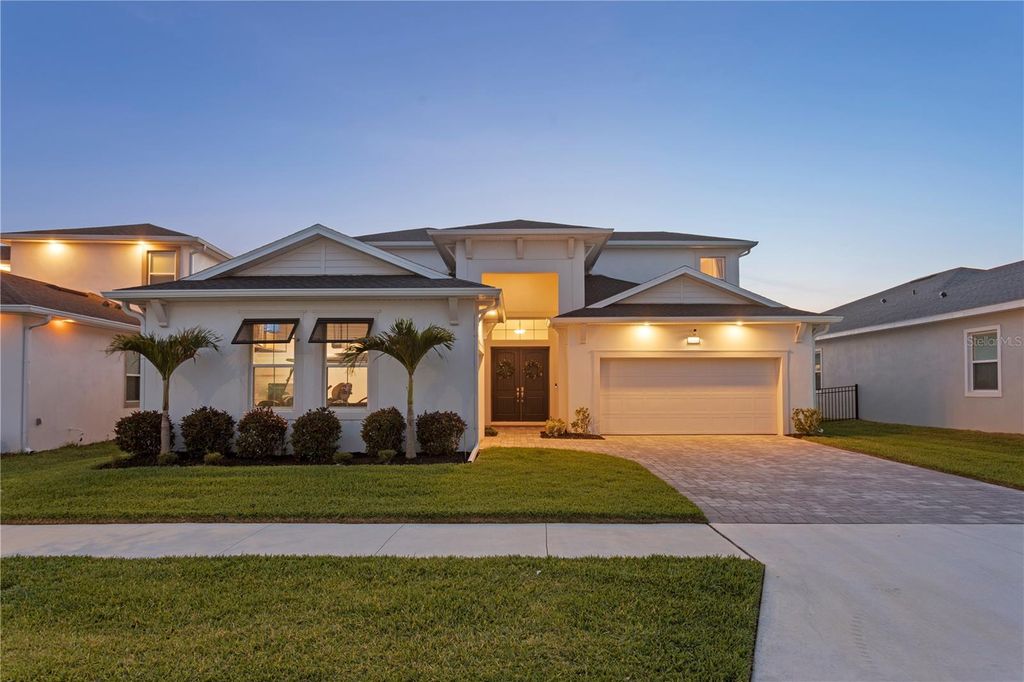Photo of 8346 Ivy Stark Blvd, Wesley Chapel, FL 33545 (MLS # TB8374250)