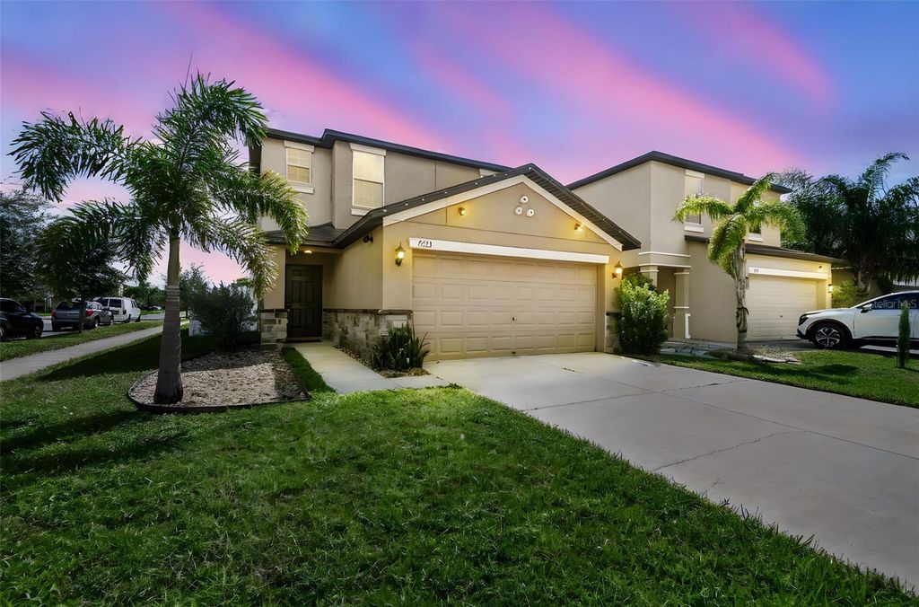 Photo of 7423 French Marigold Avenue, Tampa, FL 33619 (MLS # TB8429401)