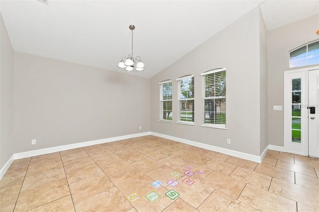 Photo of 324 Anorak Street, Groveland, FL 34736 (MLS # O6445417)