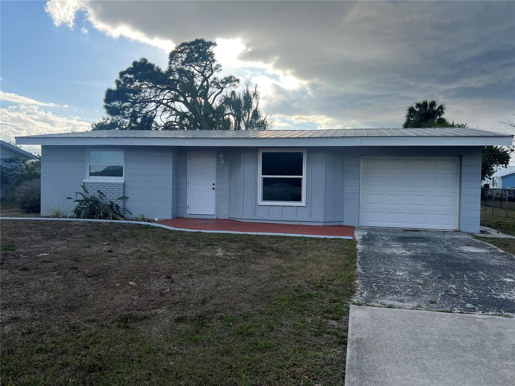 Photo of 394 Ferris Drive NW, Port Charlotte, FL 33952 (MLS # C7522726)