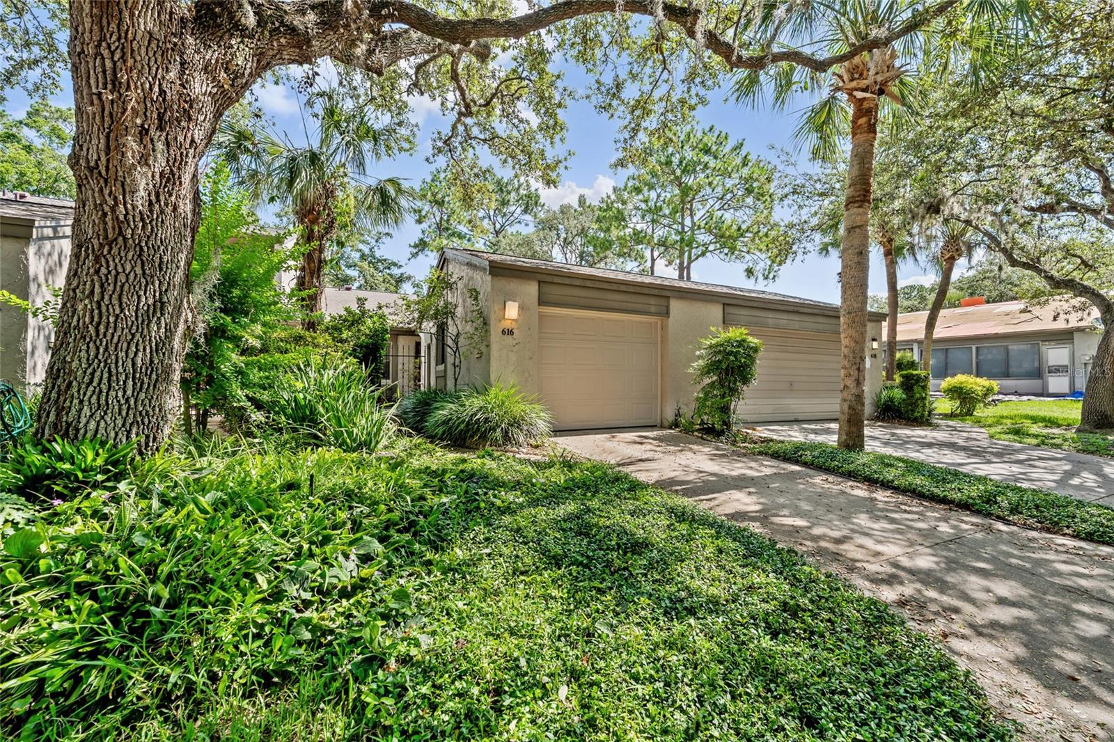 **Price Reduction!** Lake of the Woods townhome opportunity you don't want to miss! This 2-bedroom, 2-bath, 1 car garage oversized townhome provides a comfortable living space with room for entertaining. Enjoy your own private courtyard where you can enjoy your morning cup of coffee and relax in the evening with a glass of wine. Once inside, you will immediately be impressed with the vaulted ceilings and open concept living and dining room areas where natural light abounds providing a bright and airy living space. The enclosed patio provides additional living space and can function as an office, workout room or whatever your lifestyle desires. The eat-in kitchen looks out over your outdoor courtyard adding light and nature to the space. The kitchen has ample cabinet space, a closet pantry, and a laundry closet complete with a washer and dryer. Both oversized bedrooms are fashioned with walk-in closets. The primary ensuite bathroom has a private walk-in shower and large vanity space. Enjoy peace of mind with a brand-new roof in 2025. The community amenities are beyond compare. Located in a vibrant community featuring a pool, tennis and basketball courts, a fitness center, playground, picnic pavilion, community library, and fishing pier—there is something for everyone to enjoy. If you are looking for a serene oasis to call home – don’t miss your chance to schedule your private showing today and see why this is the perfect place to call home!