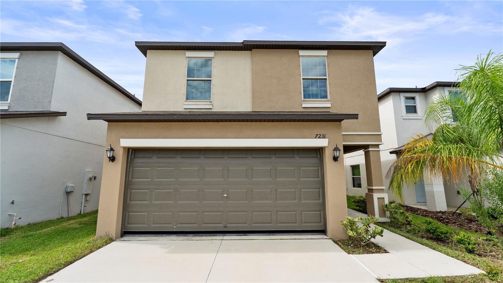 Welcome to 7231 Spring Snowflake Avenue, a stylish and contemporary two-story home built in 2022, located in Tampa’s sought-after Touchstone community. This 1,764 sq ft residence offers 4 spacious bedrooms and 2.5 bathrooms, including a serene upstairs owner’s suite with a private bath. The open-concept floor plan features a bright and inviting great room that flows seamlessly into the modern kitchen and dining area, perfect for both daily living and entertaining guests. The kitchen is equipped with sleek finishes, modern appliances, and ample space for meal preparation, while the inside laundry and attached two-car garage add everyday convenience. Enjoy the Florida lifestyle with a covered patio that extends your living space outdoors. Touchstone is a thoughtfully planned, family-friendly community with landscaped sidewalks and access to modern amenities such as clubhouse, fitness center, huge community pool, playground just to name a few. You have to come and see it for your own eyes. Property locates just minutes from shopping, dining, and major highways for an easy commute. This home blends comfort, style, and convenience, making it an excellent choice for your next move!!