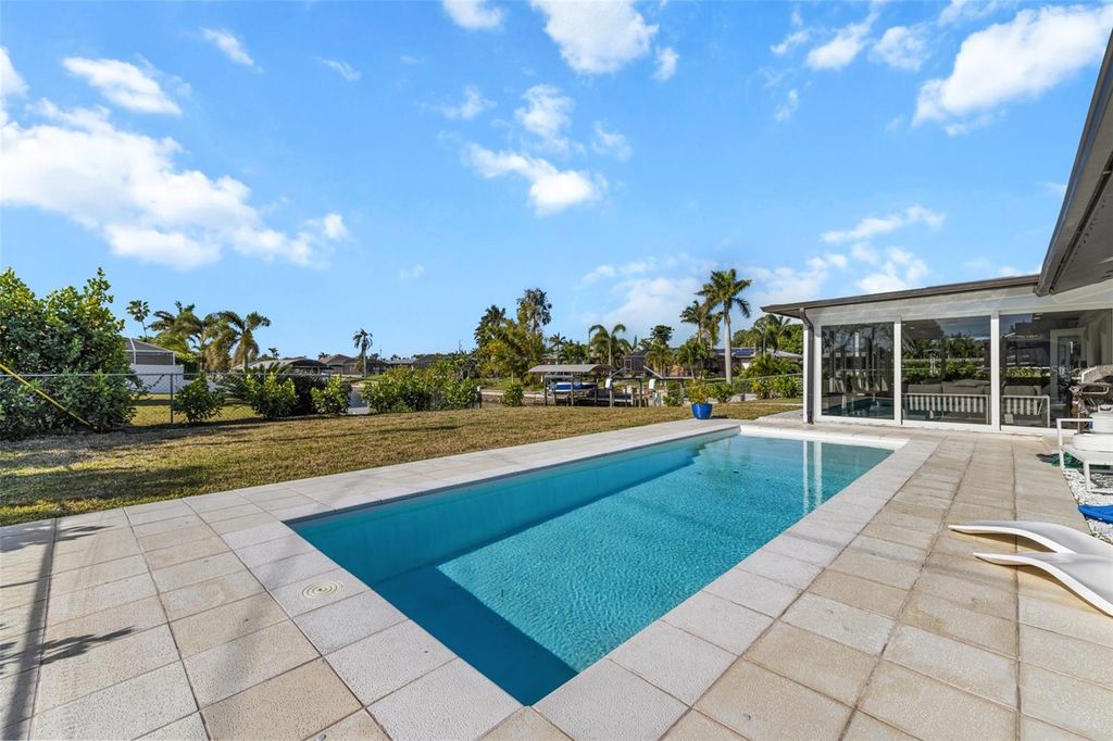 Photo of 1728 Cornwallis Parkway, Cape Coral, FL 33904 (MLS # OM702049)