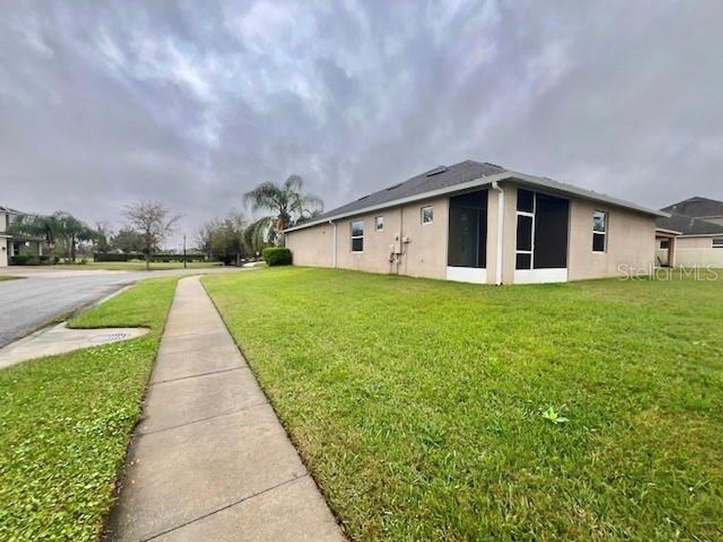 Photo of 12121 Homestead Park Lane, Orlando, FL 32824 (MLS # S5142127)