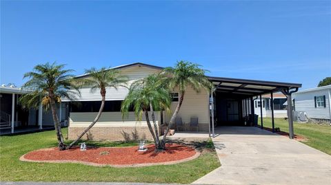 Photo of 6562 Chinaberry Drive NE, Winter Haven, FL 33881 (MLS # P4934676)