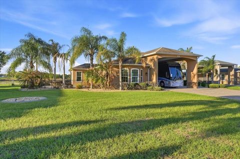 Photo of 576 Meandering Way, Polk City, FL 33868 (MLS # L4960258)