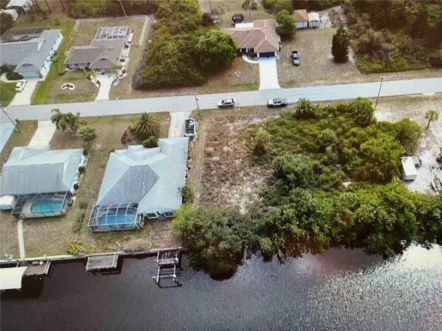 A marvel of a lot on the canal leading to Myakka River and the Gulf of Mexico. Boater's Paradise! In close proximity to amenities and beaches. Build your dream home with a dock and enjoy!