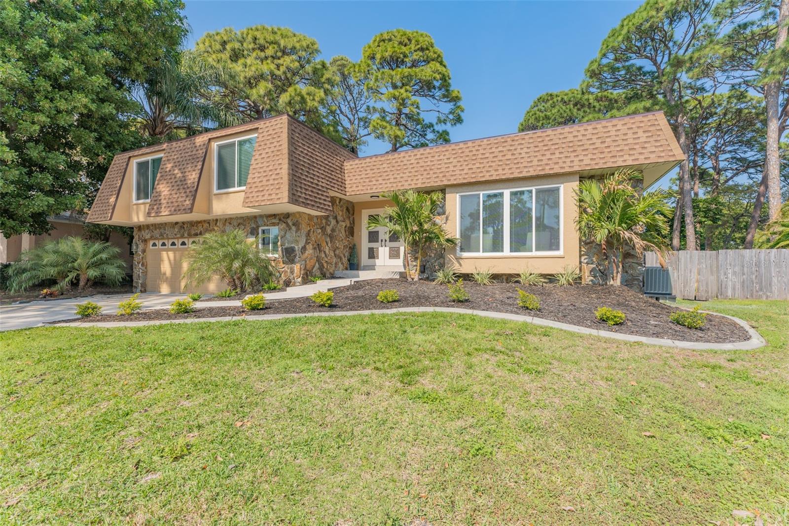 Welcome to your dream home in Seminole, Florida! This stunning home offers a perfect blend of modern luxury and convenient location, making it an ideal choice to call your next home. This home in located in a A rated school system. Situated in a desirable cul-de-sac, enjoy a quiet and private setting, away from the hustle and bustle of main roads. Its proximity to world-famous beaches ensures you can easily access the sun, sand, and surf just a short distance from your doorstep. The house itself has undergone a complete renovation, resulting in a tastefully updated and contemporary living space. Every detail has been carefully considered, providing a fresh and stylish ambiance throughout. Roof was just replaced in 2022, Brand new kitchen with quartz counter tops, stainless steal appliance package, open concept floor plan, wet bar area, and so much more! The expansive fenced in backyard with pool will offer plenty of space for outdoor activities and relaxation! This property is not located in an HOA! Come check out this home before its too late!