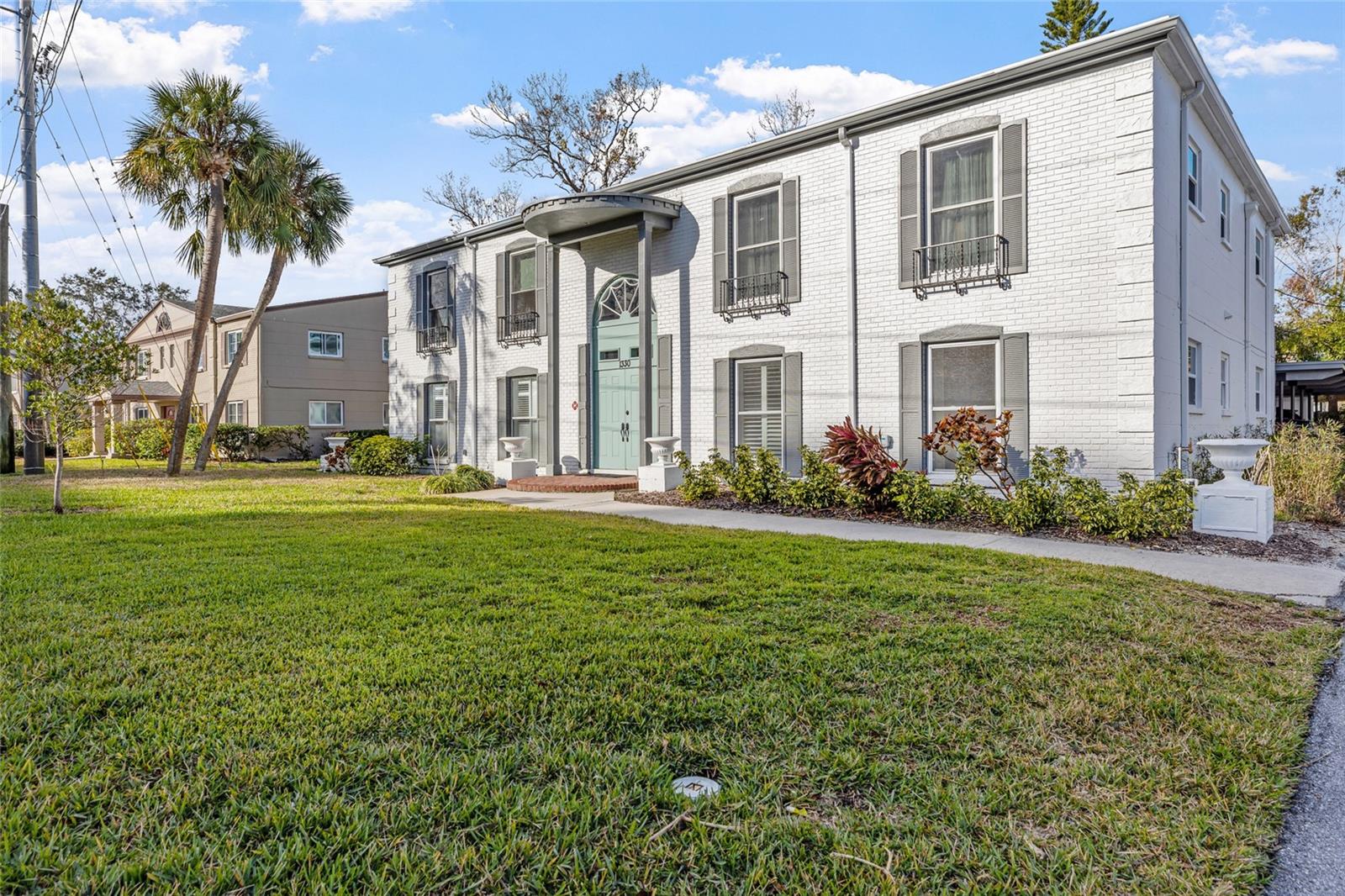 Location, location, location! This charming 2-bedroom, 2-bathroom home with a 1-car carport is a rare gem in the highly desirable Snell Isle community. Freshly painted and awaiting your personal touch, this home is the perfect canvas to create your dream space. With key upgrades already completed, including a new air conditioning system in 2017 and hurricane-impact windows installed in 2023, this home combines comfort, security, and potential. The spacious kitchen is equipped with stainless steel appliances and opens to a bright, airy Florida room, creating a seamless flow for both entertaining and relaxing. A brand-new dishwasher (2024) and a washer/dryer (2018) provide added convenience, while an additional storage closet helps keep things organized. A rear entrance from the parking space ensures easy access, and with 10 unassigned parking spots out front, there’s plenty of room for guests or extra vehicles. The serene bathrooms offer a spa-like atmosphere, ideal for unwinding. You’ll love the tranquil surroundings, just blocks from Tampa Bay. For yacht club members, the Saint Petersburg Yacht Club annex marina is directly across the street, adding to the lifestyle of relaxation and convenience this location offers. The Vinoy Golf Course, Clubhouse, and Pool are less than a mile away, and with no traffic lights between you and vibrant downtown St. Pete, you’re never far from the heart of the action. Additional updates include a new hot water heater (2021), ensuring peace of mind and efficiency. Did we mention this home is in Snell Isle? It’s more than just a location—it’s a lifestyle. Don’t miss out on this incredible opportunity!