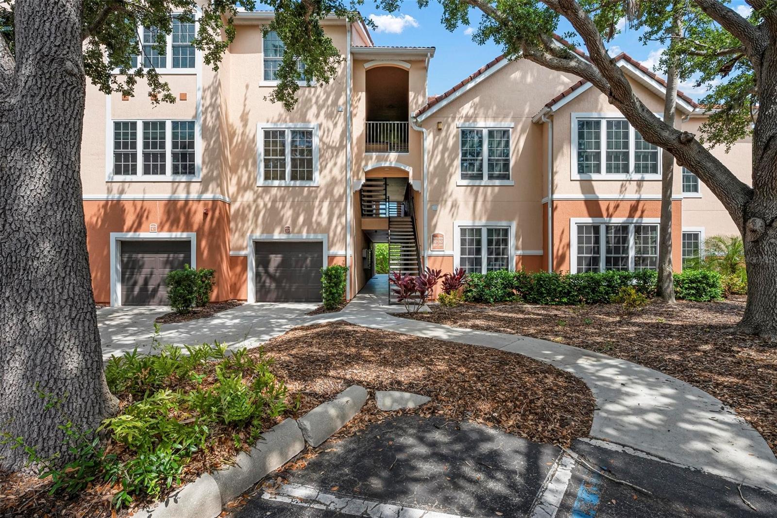 WELCOME HOME! THIS GORGEOUS 3 BEDROOM, 2 BATHROOM, 1 CAR GARAGE, 1ST FLOOR CONDO IS LOCATED IN THE HEART OF PALMER RANCH! Bella Villino is a gated resort style community that is just minutes from Siesta Key Beach. When you walk into this home you will be blown away by the light, bright, open and airy feeling you get. With the large sliding glass doors, brand new flooring and paint this home has everything you and your family have been looking for. The kitchen is updated with granite counter tops and white cabinets and looks over the living and dining space. In the living room you will find oversized sliding glass doors that let in tons of natural light and lead out to your private, screened in back porch. The primary suite features plenty of space for a king size bed and a large walk-in closet. The primary bathroom is updated with granite countertop and a tub/shower combo. The spare bedrooms also offer great space and share an additional updated bathroom with a tub/shower combo. The laundry is located inside the unit for convenience. This home also offers a large 1 car garage that features tons of extra storage space. Bella Villino is a gated community that features an elegant clubhouse with security cameras, resort style pool and spa, indoor racquetball, basketball, billiards, business center, tennis court, car detail area, gas grills, picnic areas and pet stations that are located around the property. Palmer Ranch is close to world class beaches, marinas, the popular Legacy Trail (bicycle/jog/walk), shopping, restaurants, golf courses and much more. Call for your private showing today!