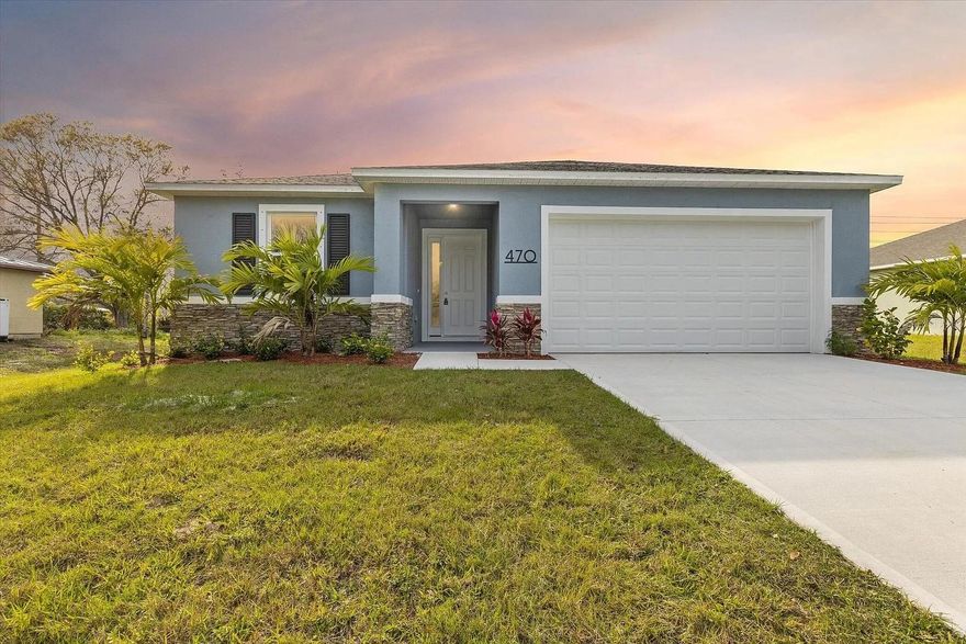 This Luxurious 4-bedroom, 2 Bath Property is exquisitely built with all of the upgrades nestled in the heart of Palm Bay. Inside you will find a wonderfully open floor plan perfect for gatherings and entertaining. The capacious Chef's Kitchen is stylishly equipped with an island, solid wood cabinets, stainless steel appliances and ample storage. The contemporary living space is bursting with natural light and a flowing layout that is inviting and relaxing. Luxuriate in the vast Primary Suite that offers a collection of modern conveniences. This beautiful house is full of INCLUDED upgrades: solid wood soft close cabinets in the kitchen and in the bathrooms, luxury vinyl plank flooring (no carpet), and floor-to-ceiling tiles in the showers, bathroom niches, granite countertops in the kitchen and baths, 9'4'' ceilings, 8-foot doors, luxury handles, and an electric garage door opener.