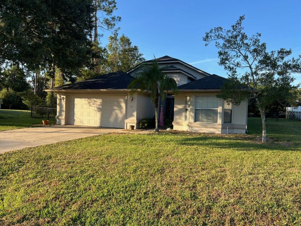 Photo of 20 Woodholme Lane, Palm Coast, FL 32164 (MLS # FC314328)