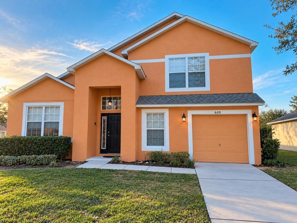 Photo of 600 Scrub Jay Way, Davenport, FL 33896 (MLS # O6447818)