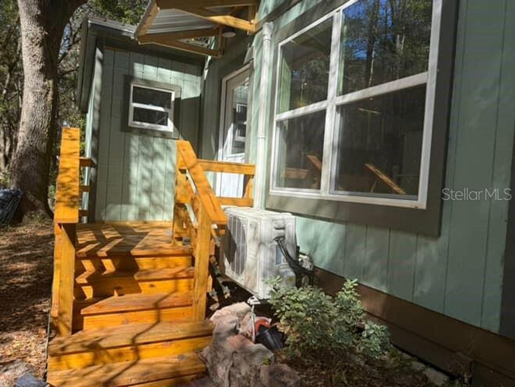 Photo of 17773 SW 36th Loop, Dunnellon, FL 34432 (MLS # OM717447)