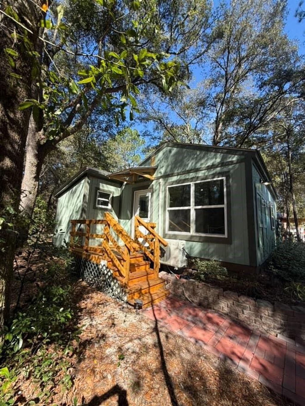 Photo of 17773 SW 36th Loop, Dunnellon, FL 34432 (MLS # OM717447)