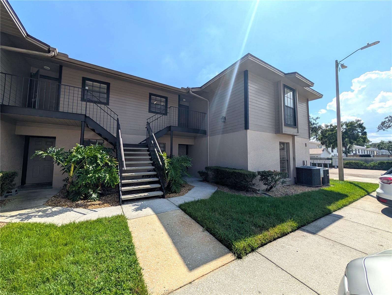 Close to the USF area, this affordable 2BED, 2Bath condo in the amazing community of Ashford Green. Assigned parking. This is a 2nd floor and includes washer/dryer! Natural colors, ceramic tile or carpet flooring throughout the home. The kitchen offers plenty of counter and cabinet space, great for storage. Additionally, the kitchen offers a breakfast bar for those quick mornings to get up and go! Each bedroom provides great private space and closet storage. This property has two bathrooms, neutral colors just waiting for your stylish decor. The private patio is completely screened to begin your day reading a good book, planning your day or yoga anyone? The luxury of enjoying the pool life in Florida, why not take a dip in the community pool to cool off or simple rest and relaxation. This is a pet friendly property, call for details. Great location, minutes from USF! Close to great shopping, fine dining, entertainment and downtown Tampa connections. An administrative fee of $75.00 will be charged at the time of move-in. This property is move in ready. WE SHOW PROPERTIES 7 DAYS A WEEK!