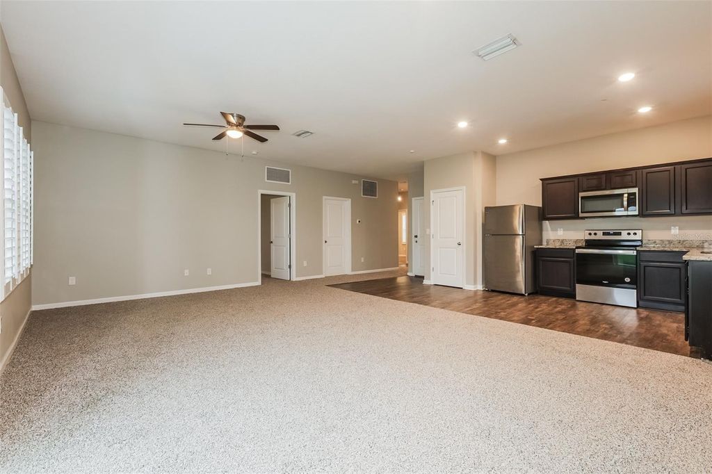 Photo of 730 Garden Oaks Square, Seffner, FL 33584 (MLS # O6354097)