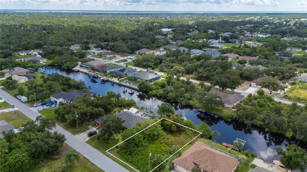 Photo of 17357 Robinson Avenue, Port Charlotte, FL 33948 (MLS # C7498640)