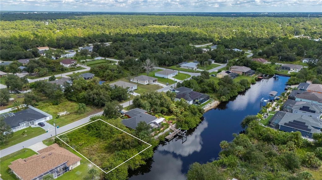 Photo of 17357 Robinson Avenue, Port Charlotte, FL 33948 (MLS # C7498640)