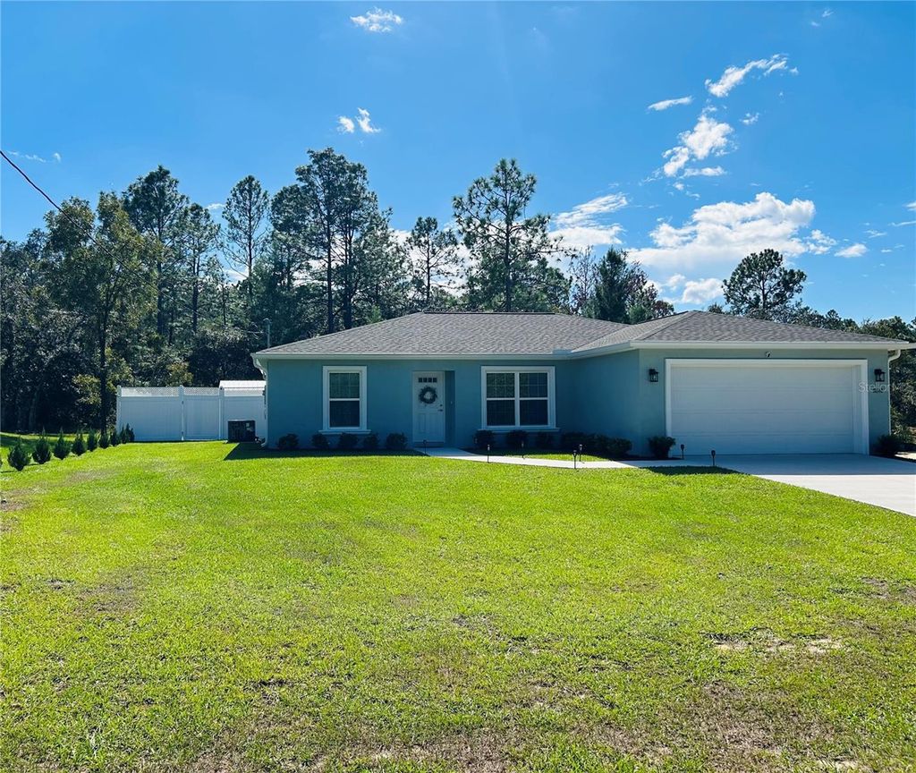 Photo of 8848 N Paradisea Drive, Citrus Springs, FL 34433 (MLS # TB8442310)