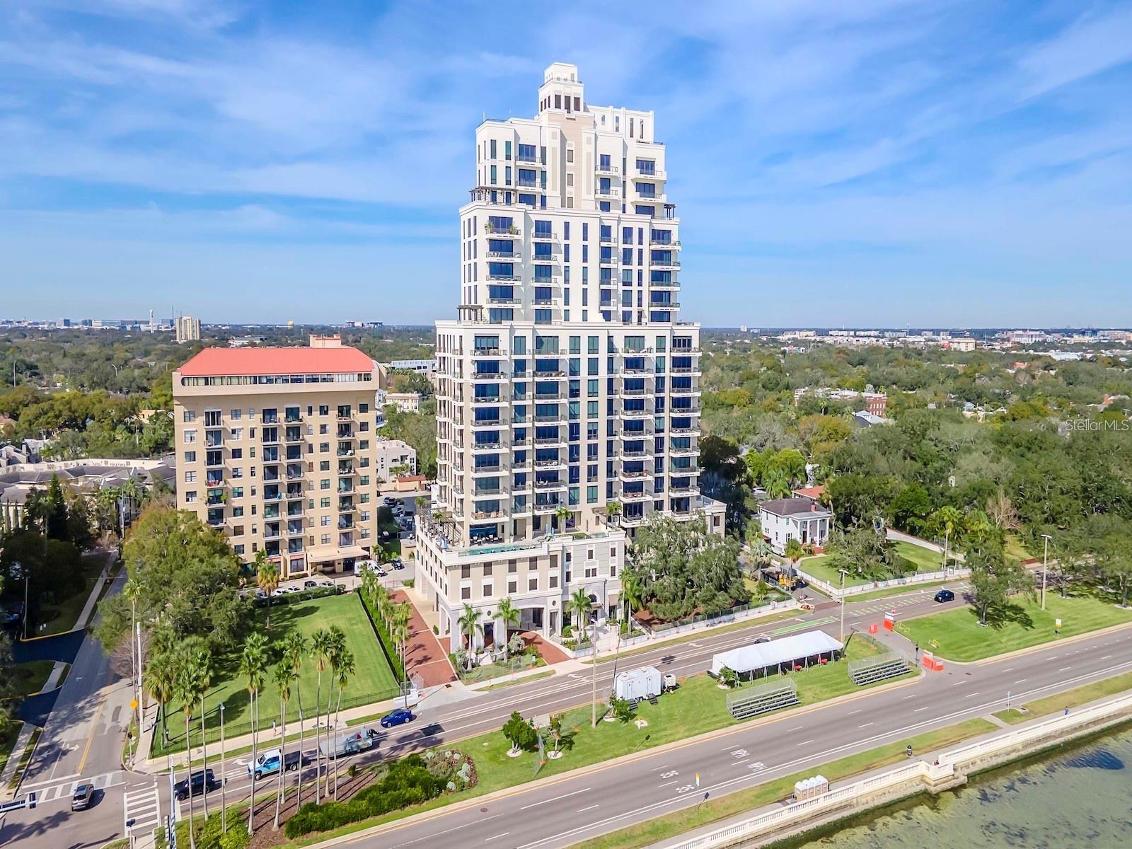 HYDE PARK HOUSE Available Mid December. Luxurious 2000 SqFt condominium with 2 bedrooms plus den/guest room and 3 full baths.Enjoy Western views over the Hyde Park neighborhood from this immaculate residence and expansive terrace with glass railings. Open concept split bedroom layout features 10 Ft ceilings, large porcelain tile throughout, remote controlled window treatments, designer lighting fixtures plus high end finishes. Chef’s delight kitchen has huge waterfall center island, Quartz countertops, European cabinetry with loads of storage, Gaggenau appliances, gas cooktop and is open to the oversized sun filled living and dining room. Spacious primary bedroom also has balcony access features two good sized outfitted closets, en-suite bathroom with dual sinks, large soaking bathtub and spa inspired shower. Secondary bedroom also with en-suite bathroom and outfitted closet. The additional den is a perfect at home office or overflow guest room.  There’s a separate laundry room with full size washer and dryer plus utility sink and more storage cabinets. The condo comes with 2 assigned parking spaces and climate controlled storage. The building has a 24 hour front desk concierge, waterfront amenity level with resort style swimming pool and spa, grilling area, fire pit, club rooms and on site property management. Located on famed Bayshore Boulevard and steps to historic Hyde Parks’s upscale dining and shopping.