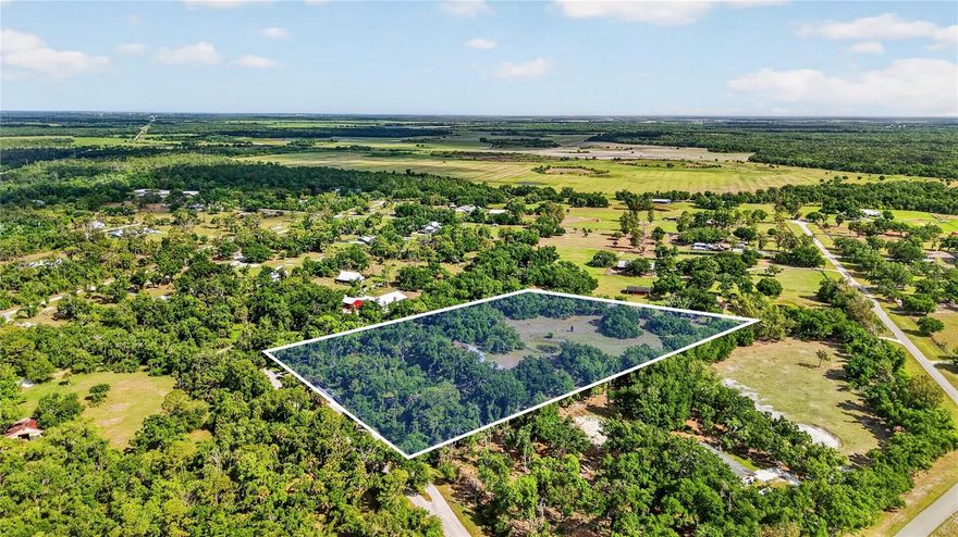 Located in the highly sought-after Myakka Valley Ranches, this 5.74-acre property offers privacy, space, and endless potential surrounded by majestic oak trees and natural Florida beauty. Situated at one of the highest elevations in the valley, this property is located in Flood Zone X and has never flooded, offering added peace of mind. A scenic pond on the property adds to the charm and creates a peaceful setting to enjoy the outdoors.

This 3-bedroom, 2.5-bathroom home features 1,790 sq.ft. of living space, a pool, hardie board siding and a 2-car garage, providing a solid foundation for someone ready to update and make it their own. There is also additional space above the garage with the potential to be converted into a 4th bedroom, offering even more flexibility and value. While the home does need TLC, two major improvements have already been completed with a 2021 roof and a 2019 A/C, giving buyers a great head start as they create their ideal country retreat.

Enjoy peaceful acreage living with plenty of room for horses, barns, gardens, or additional structures, all while being conveniently located near A+ rated schools, shopping, and dining. Myakka Valley Ranches is known for its large homesites, private roads, and quiet rural feel, yet you're still approximately 30 minutes to world-famous Siesta Key Beach and a short drive to Downtown Sarasota.

Whether you're looking for a renovation project, investment opportunity, or a chance to build equity in a desirable acreage community, this oak-filled, high-and-dry property offers incredible potential in a prime Sarasota location. Priced to sell quickly—schedule your tour today!