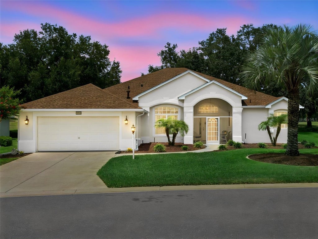 Photo of 21115 Royal St Georges Lane, Leesburg, FL 34748 (MLS # G5115585)