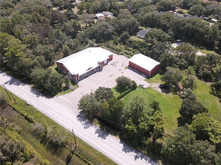 Incredible Opportunity to own a beautifully designed 7,000 (5,250 A/C) square foot building with an additional 2,000
square foot out building, in the northeast corner of Hillsborough county in a terrific setting situated on over 2 acres of
nicely treed land. This property would be a perfect church, or office/warehouse for a corporate center.  The uses are
bountiful and waiting to be explored. The photos tell it all.