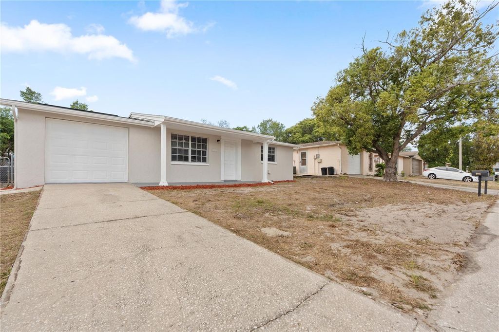 Photo of 9915 Richwood Lane, Port Richey, FL 34668 (MLS # W7885313)