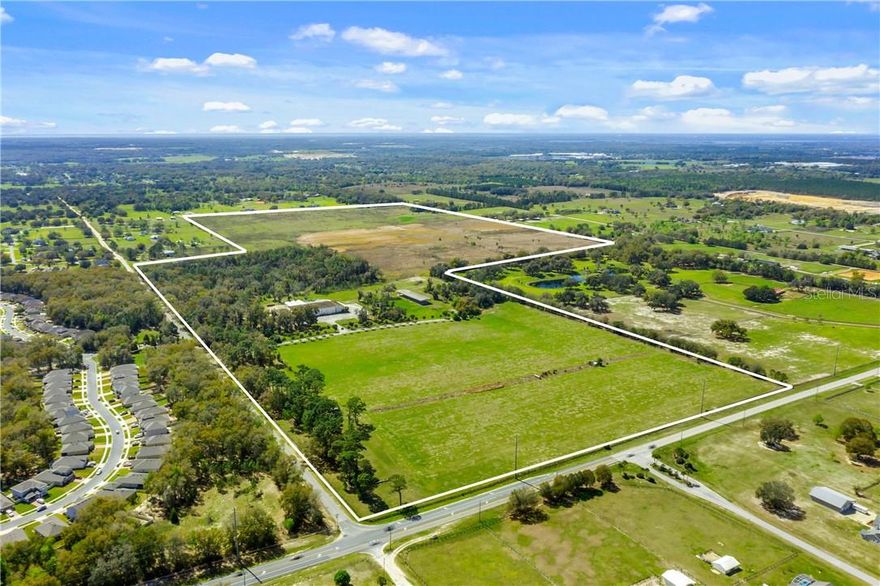 This 189 ACRE PROPERTY is the only larger parcel currently available in North Lake County.  This property is located next to the gated community of Sorrento Springs and its Eagle Dunes Golf Course, and minutes away from Mount Dora, Eustis and Tavares.  Road frontage is estimated to be almost 2600 feet as it sits on the corner of Cardinal and SR 44.  The land is gently rolling in some areas, flat in most others, and is all high and dry with the exception of about 3 acres in the southwest corner.  There are two entrances to the property off Cardinal and a turn lane from SR 44 when traveling west.  The property is about a half mile from the Publix shopping center on the corner of CR 437 and SR 44.  The property perimeter is fenced and there is one grove of trees on the central east side of the property.  There is a warehouse and office building that was once used for horticultural purposes but the business is no longer operational. It's an easy commute from here to all parts of Central Florida as the new Hwy 429 beltway is minutes away to the south.  Make your appointment today for a private tour of the 2 combined parcels of land that make up this unique North Lake County property.