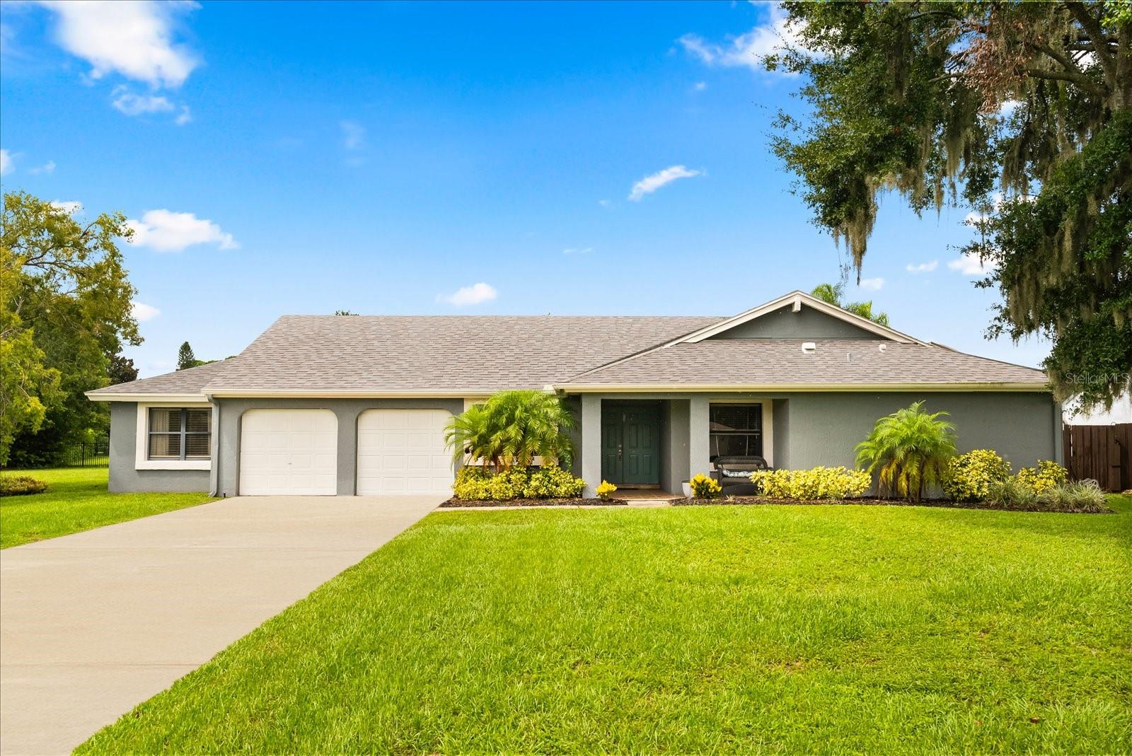 Welcome to this beautifully remodeled 5-bedroom, 3-bath home located in the highly sought after guard gated golf community of Orange Tree. Situated on a rare corner lot just under half an acre, this property combines modern updates with the lifestyle and amenities of one of Orlando’s premier neighborhoods. The spacious floor plan includes five bedrooms plus an office, offering plenty of room for family, guests, or working from home. Freshly finished with knockout textured ceilings throughout, the home feels bright, open, and inviting.
The kitchen has been tastefully renovated with sleek quartz countertops, brand-new cabinets, and stainless steel appliances, making it the perfect centerpiece for entertaining and everyday living. All three bathrooms feature stunning updates, including large-format tile showers, new vanities, and modern fixtures. The backyard, fenced on three sides, provides endless opportunities. Whether you envision a pool, outdoor kitchen, or expansive garden, there is plenty of space for any or all of these options. A covered patio extends your living space outdoors, where you can relax and enjoy sunsets or even catch the Universal fireworks in the distance. Homes with 5 bedrooms, 3 baths, fully remodeled, and on a spacious corner lot are a rare find in Orange Tree, making this an incredible opportunity to own in one of the area’s most desirable golf communities. Located minutes from Universal Studios, Sea World, Disney, Restaurant Row, and only 20 minutes from Downtown and the airport, it is the ideal location to be located close to everything but not have to deal with the traffic. Come look at this home and see all that Orange Tree living has to offer.