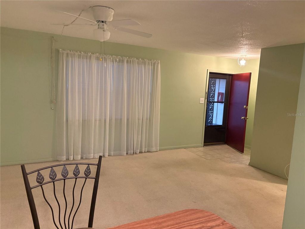 Photo of 5505 Hernandes Drive #210, Orlando, FL 32808 (MLS # O6381551)