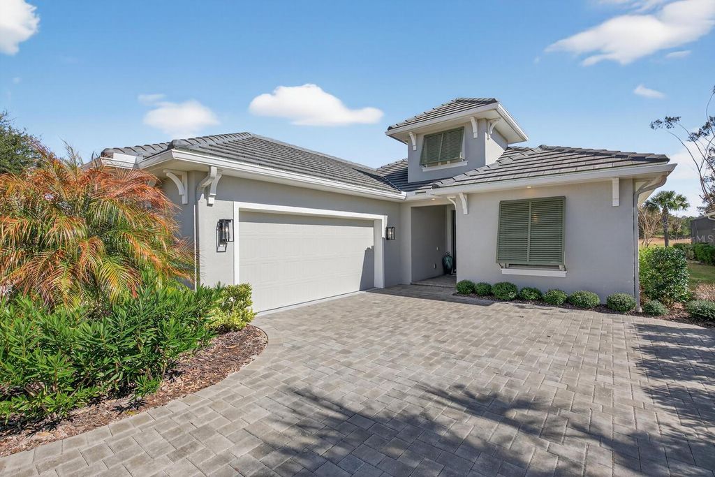 Photo of 401 Bourganville Drive, Palm Coast, FL 32137 (MLS # FC315725)