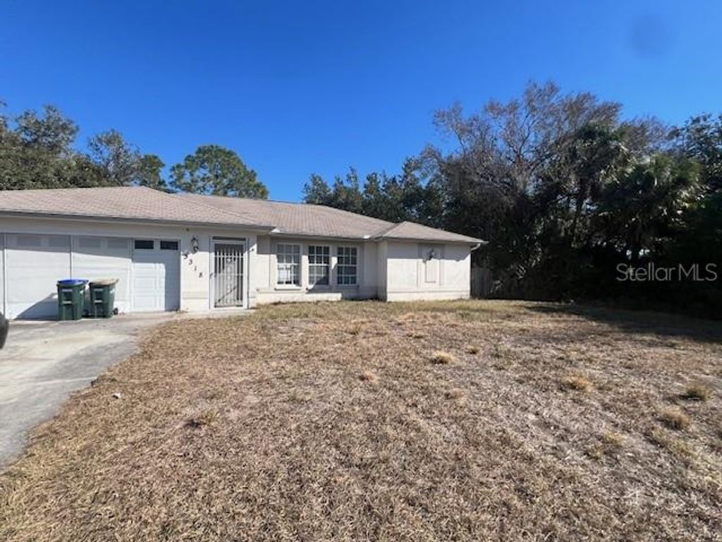Photo of 3318 Colfax Lane, North Port, FL 34286 (MLS # TB8474754)
