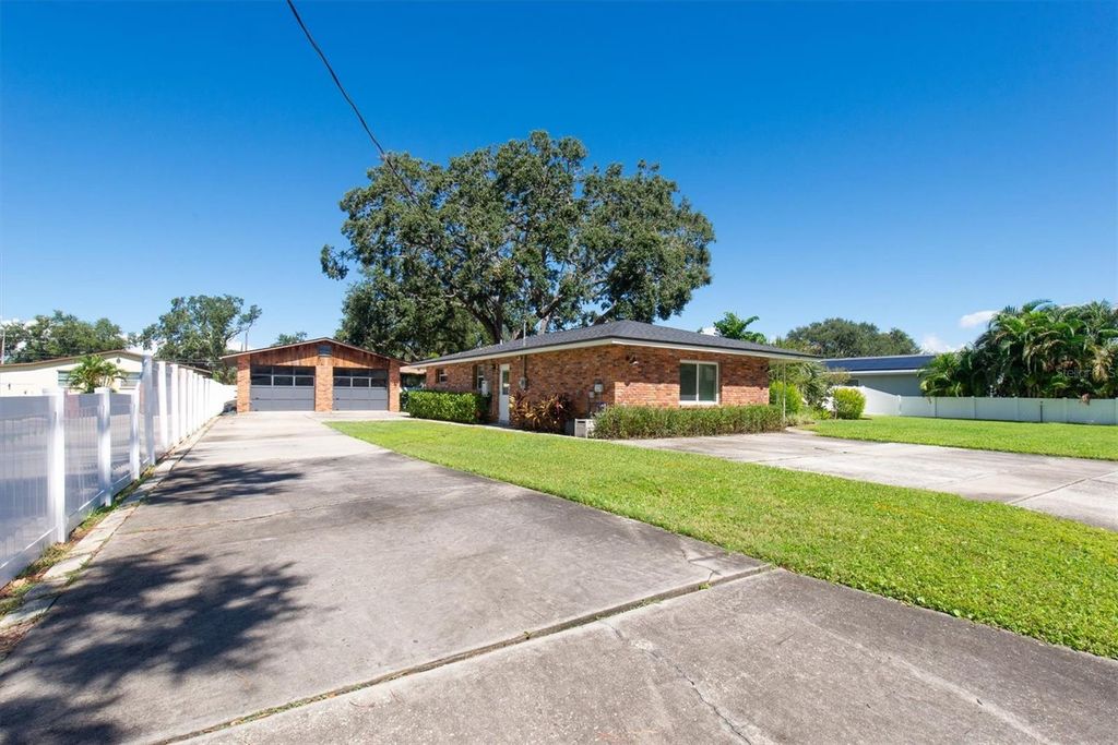 Photo of 126 SE Madison Circle N, St Petersburg, FL 33703 (MLS # TB8432103)