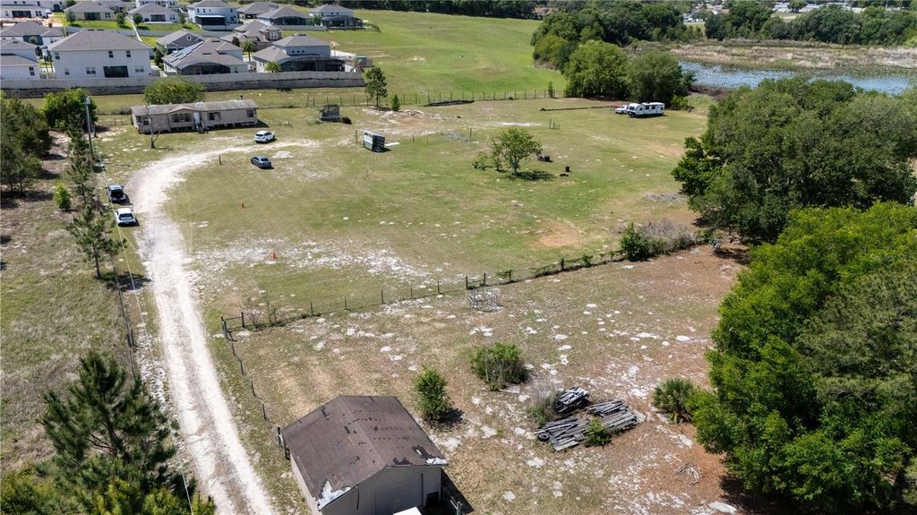 Photo of 12606 S Grassy Lake Road, Minneola, FL 34715 (MLS # O6400387)