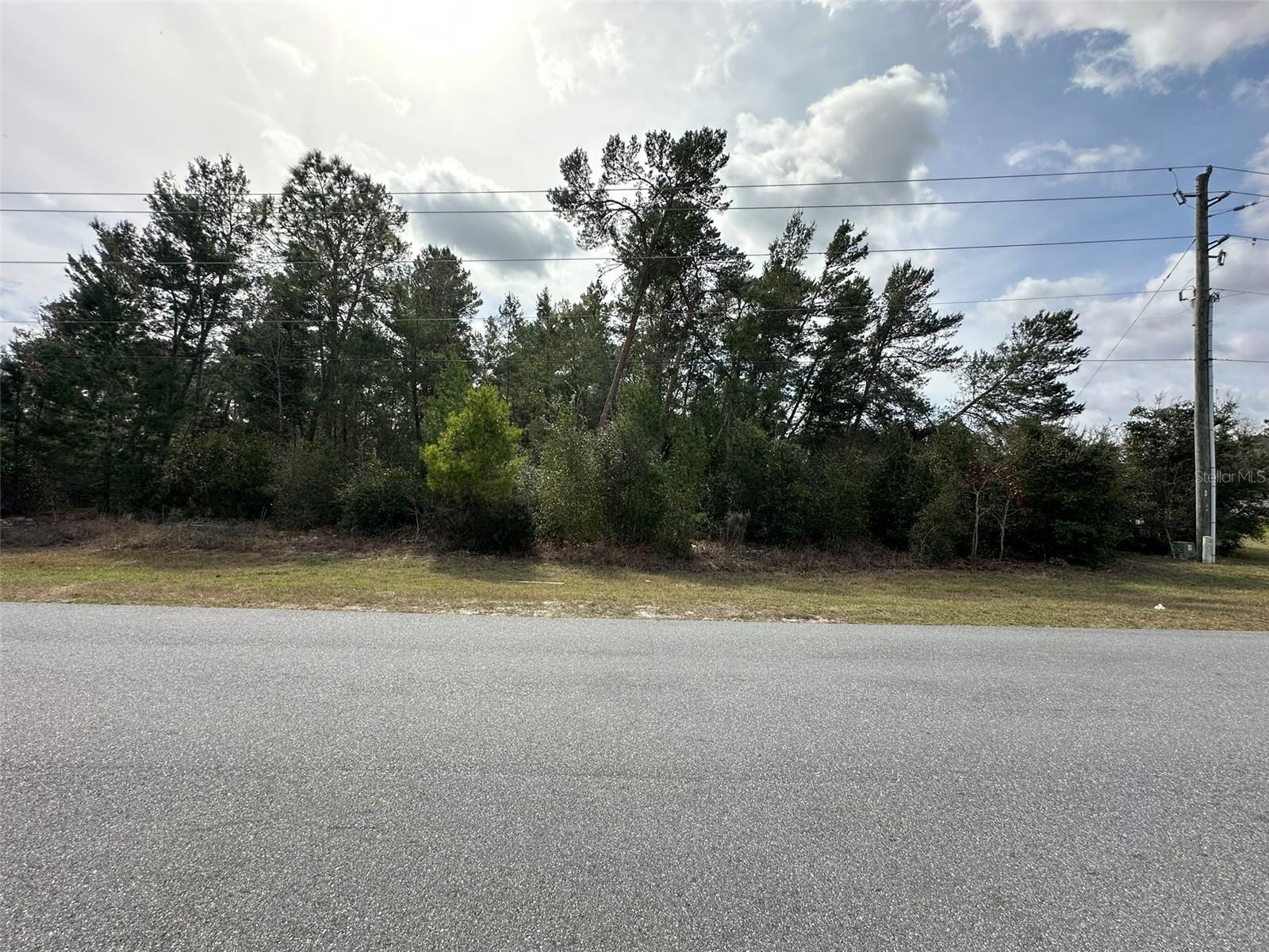 Prime .62-Acre Vacant Lot in Ocala Waterway – Build Your Dream Home! Nestled in the desirable Ocala Waterway community, this spacious .62-acre lot offers the perfect blend of tranquility and convenience. Located in SW Ocala, this property provides easy access to shopping, dining, medical facilities, and top-rated schools, all while maintaining the peaceful charm of a residential neighborhood.
This high and dry parcel is a fantastic opportunity to build your dream home with no HOA restrictions. It features a Potential Water Connection Extension (Not Required), offering added flexibility for future development. The rear adjoining property is also available for purchase, making it an ideal option for those seeking a larger homesite or investment opportunity. Ocala Waterway is known for its spacious lots, well-maintained homes, and proximity to the newly developed SW corridor, including the World Equestrian Center and I-75 for easy commuting. Don't miss out on this incredible opportunity to own a slice of Ocala’s thriving real estate market! Secure this lot today and start planning your future in beautiful Ocala, Florida!