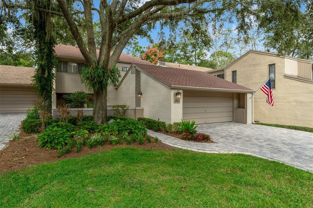 Photo of 203 Weeping Elm Lane, Longwood, FL 32779 (MLS # O6356512)