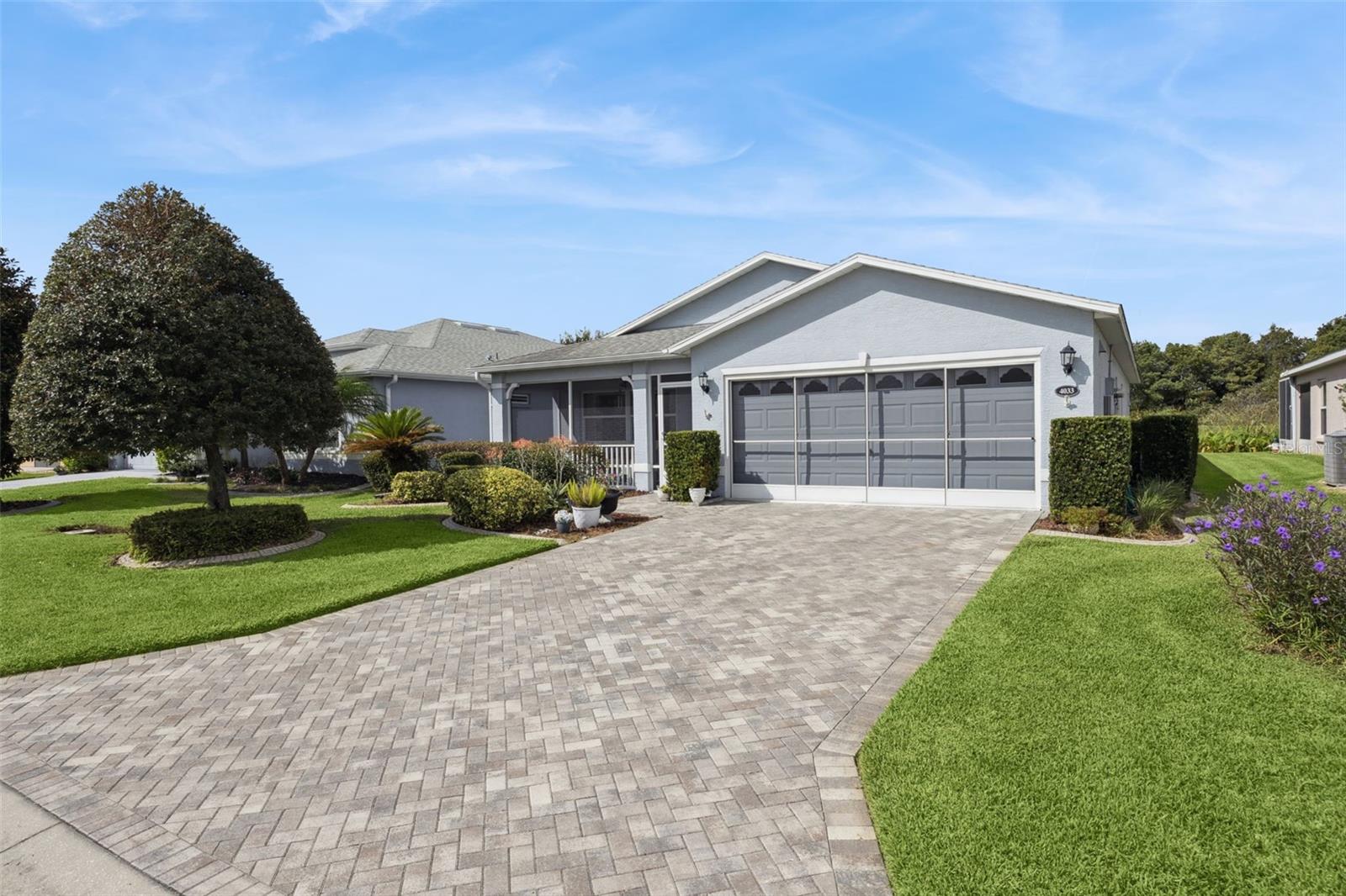 Golf Course Living in Arlington Ridge! Welcome to this well-maintained 3-bedroom, 2-bathroom home with 1,602 sq. ft. of comfortable living space, perfectly situated on the 11th green of the desirable Arlington Ridge 18-hole championship golf course. Enjoy peaceful mornings on the screened front porch and relaxing evenings on the screened lanai overlooking the green & fairway. The open floor plan offers a spacious kitchen with abundant cabinet space, making it ideal for both everyday living and entertaining. This home was designed with energy efficiency in mind—leased solar panels, R38 attic insulation, tailored foam insulation in the exterior walls, and double-glazed low-E windows all work together to drastically reduce utility costs. Many months, the electric bill is only the basic service charge. Additional features include a paver driveway, garage door screens, and low-maintenance landscaping for added convenience and curb appeal.
Living in Arlington Ridge means more than just a home—it’s a lifestyle. The community offers a restaurant, pub, movie theater, coffee shop, and a wide variety of clubs and activities to enjoy year-round. Located in South Leesburg, you’ll be close to grocery stores, pharmacies, medical facilities, and restaurants. Plus, you’re less than an hour from Orlando’s world-famous attractions and international airport, with both the East and West Coast beaches under two hours away. **Don’t miss this opportunity to live in one of Central Florida’s most sought-after active adult communities!**