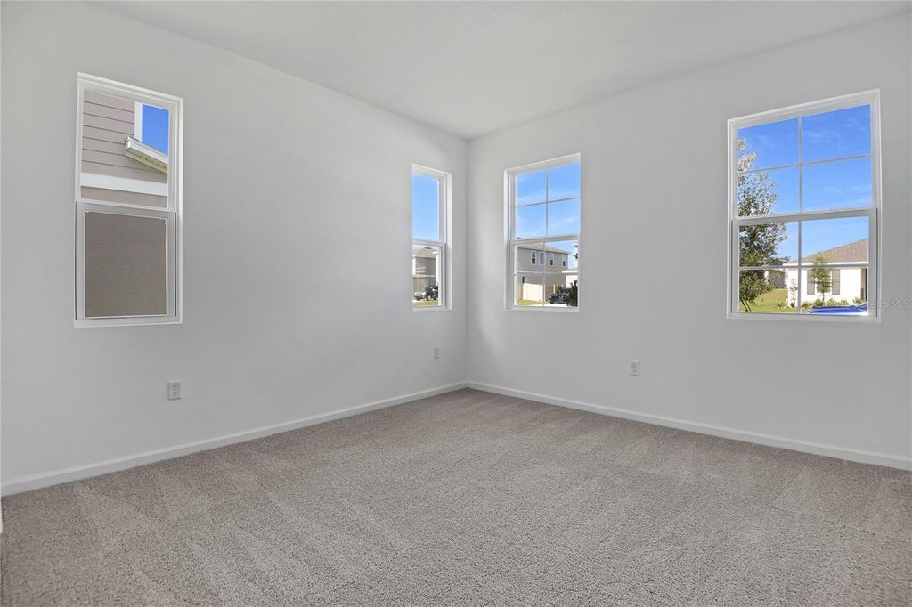 Photo of 1022 Wisteria Way, Dundee, FL 33838 (MLS # S5127942)