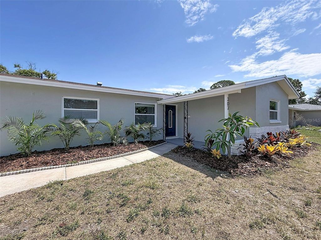 Photo of 307 87th Avenue NE, St Petersburg, FL 33702 (MLS # W7886710)