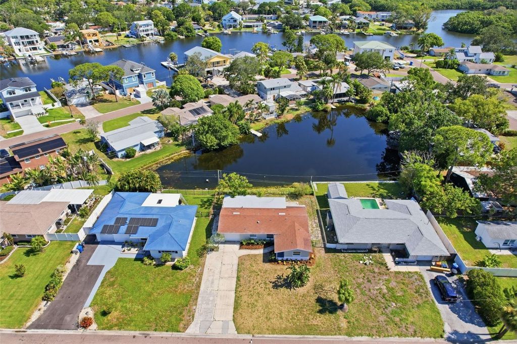 Photo of 307 87th Avenue NE, St Petersburg, FL 33702 (MLS # W7886710)