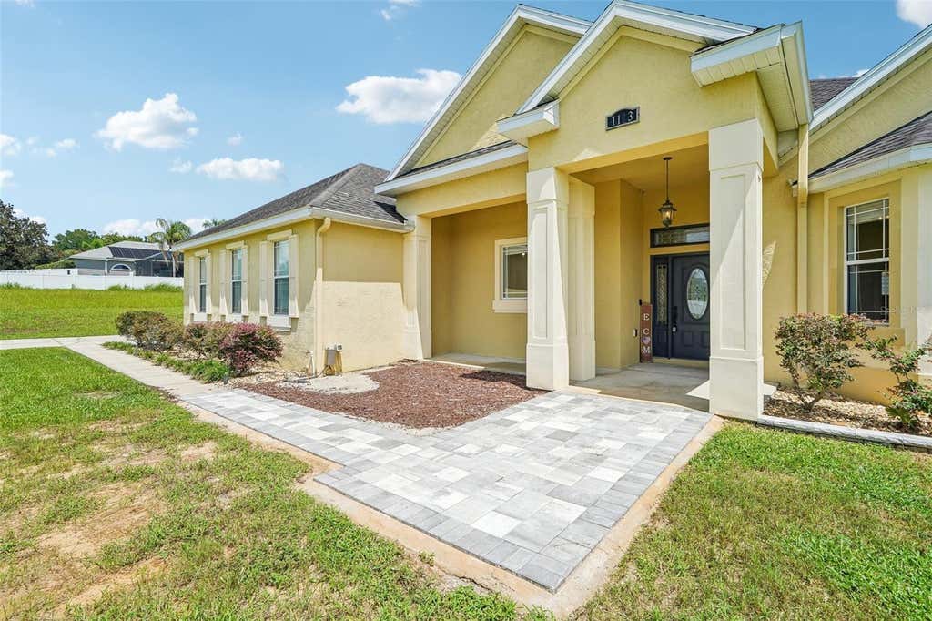 Photo of 1113 Myrtle Breezes Ct, Fruitland Park, FL 34731 (MLS # O6437057)