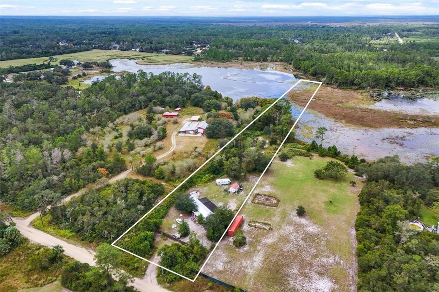 Waterfront Living with Acreage and Investment Potential!
Investor or Primary Homeowner Opportunity!
Discover the potential of this 2.94-acre waterfront property on Buck’s Lake. A gated private entrance leads to the home, set on high and dry land with beautiful lake views and a peaceful natural setting.

The home needs some TLC, but major updates are already complete — roof (2022) and HVAC (2023). Current tenants pay $1,500 monthly on a month-to-month lease and would like to stay, offering the option of continued rental income while you plan updates at your own pace.

Listed below appraised value, this home offers excellent upside potential. With renovations to the kitchen, bathrooms, flooring, and windows, the property could be worth over $290,000. The spacious floor plan includes a sunken living room, three bedrooms, and three bathrooms, along with both front and back porches overlooking Buck’s Lake.

Enjoy privacy and space for all your needs — room for an RV, pool, workshop, or recreational toys. Located approximately 30 minutes from grocery stores and medical facilities. No HOA. Home is built on a slab foundation.

Whether you’re looking for an income-producing investment or a primary home to make your own, this property combines lakefront living, acreage, and long-term value potential.