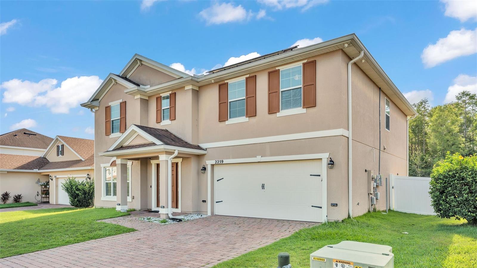 Welcome to this spacious 4-bedroom, 3-bathroom home, built in 2015 and offering 2,814 square feet of thoughtfully designed living space. Located in the desirable Waterview community with a clubhouse, pool, and playground, this two-story home is perfect for families or multi-generational living.
The main floor features multiple living and dining areas, a large kitchen with abundant cabinetry and counter space, and a full bathroom. Upstairs, you’ll find all four bedrooms—including a spacious primary suite with a walk-in closet and en-suite bath—plus a large loft/family room ideal for a second living area, playroom, or media space.
Energy efficiency is a bonus with solar panels already installed to help reduce your electric bills. Additional highlights include a fully fenced backyard, perfect for outdoor enjoyment, and a 2-car garage for convenience and storage.
Located just a short drive to Walt Disney World, Universal Studios, SeaWorld, and Orlando’s top attractions, with easy access to major highways, shopping, and dining. This home offers comfort, space, and smart savings—all in a prime Central Florida location.