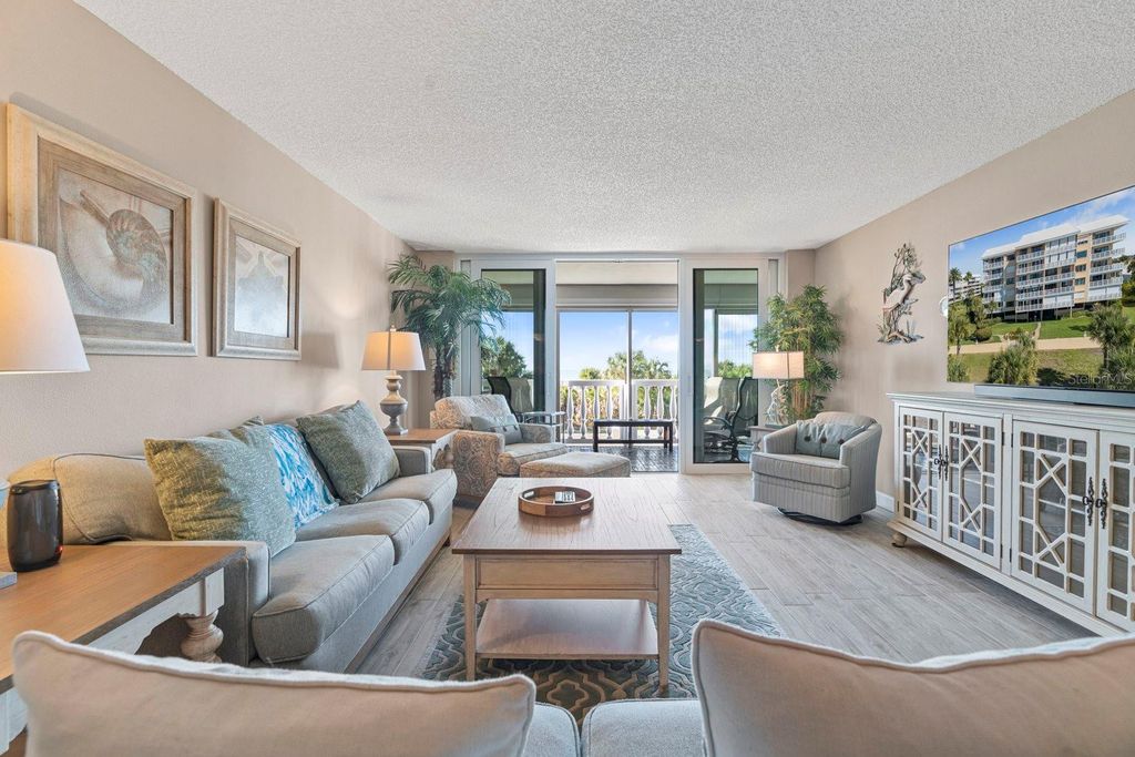 Photo of 6500 Sunset Way #121, St Pete Beach, FL 33706 (MLS # TB8466428)