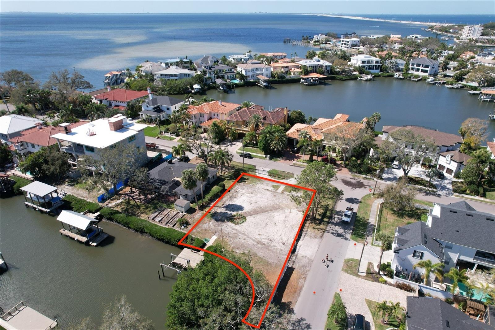 Build your Dream Home on this corner “deep” water access on protected canal. .26 acre lot located in Bayshore Estates! Zoned RS-75 with dimensions of 88 x 130. “A” Rated School District. Comes with a boat dock that leads to open Tampa Bay waters! Options for additional contiguous water and road frontage available. Bring your own plans and builder. Minutes from Tampa International Airport, I-275, Veterans Expressway, Howard Franklin Bridge, Westshore Business District along with many popular dining and shopping options. Your dream home awaits.