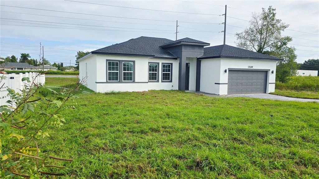 Photo of 13549 SW 47th Circle, Ocala, FL 34473 (MLS # O6351812)